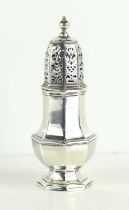 A George I silver sugar caster, octagonal baluster body on pedestal foot, pierced decoration lid