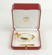 A Cartier 18ct three tone gold bangle, the clasp in the form of a screw, with the original