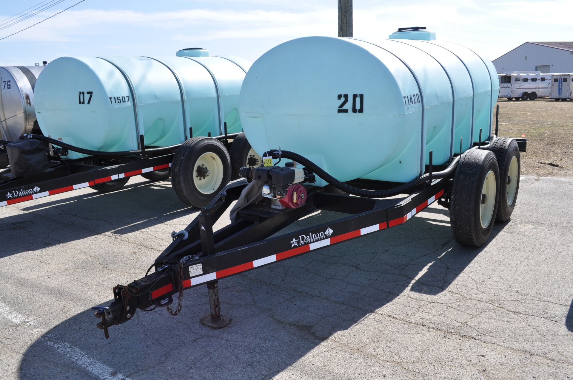 Dalton pup trailer, tandem axle, 1600-gal poly tank, Briggs & Stratton 2” pump