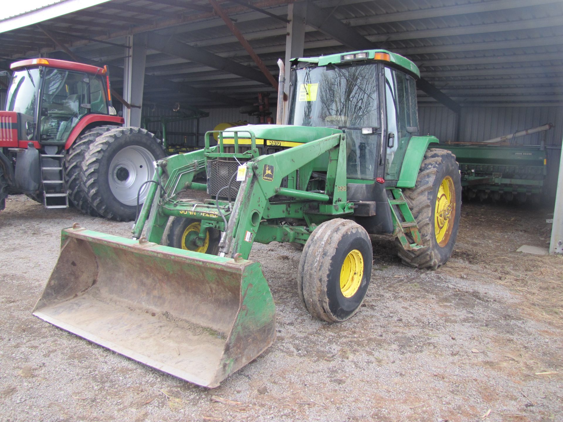 John Deere 7410 tractor w/ 720 loader