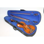 The Stentor violin with three bows in fitted case.