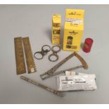 Watchmakers tools collection of tools include two brass mainspring gauges, two balance truing