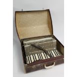 Cased accordion in fitted case (make)