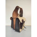 Country & Western Interest. Cow hair twin pouch saddle bag with buckle fasteners.