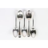 Three Georgian silver table spoons of Old English pattern, makers marks rubbed, London, 1808, a