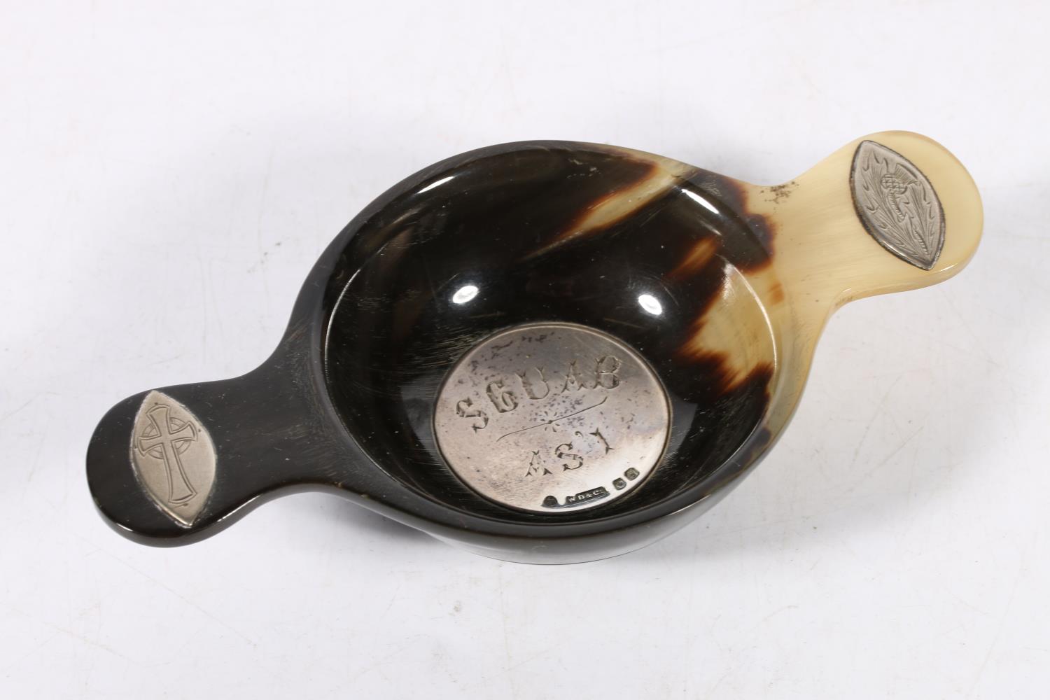 Antique Scottish silver mounted carved horn quaich, the handles inset with navette shaped silver