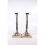 Pair of Victorian silver table candlesticks of Corinthian column design in the Adam Revival style