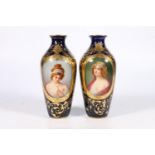 Pair of Royal Vienna porcelain vases 'Lilie' and 'Devotion', the cobalt blue ground decorated with