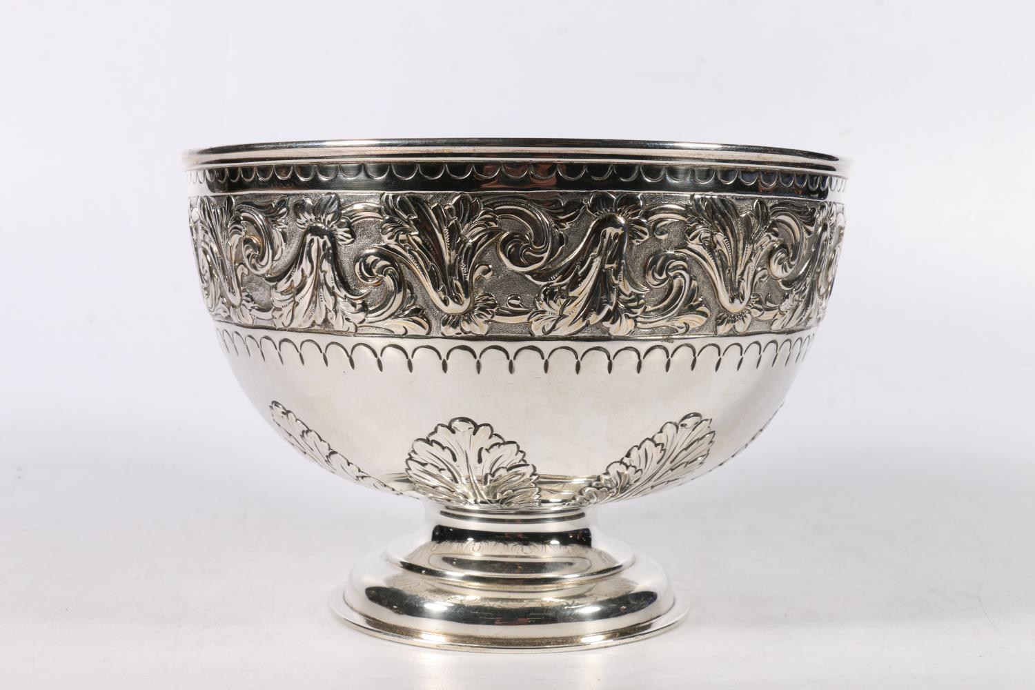 Victorian silver punch bowl with embossed decoration by Hunt & Roskell Ltd, London, 1900, the base