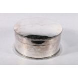 George V circular silver lidded box by Wilson & Sharp Ltd, Sheffield, 1931, 15cm diameter, 590g.