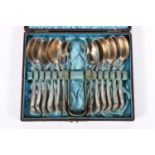 Set of twelve Victorian silver teaspoons with beaded edge and a matching set of sugar tongs,