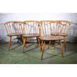 Set of four Ercol model 449A Cowhorn or Bow Top Windsor armchairs.