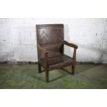 Antique provincial oak wood seat armchair, the back rest with carved repeating cupola design, 96cm