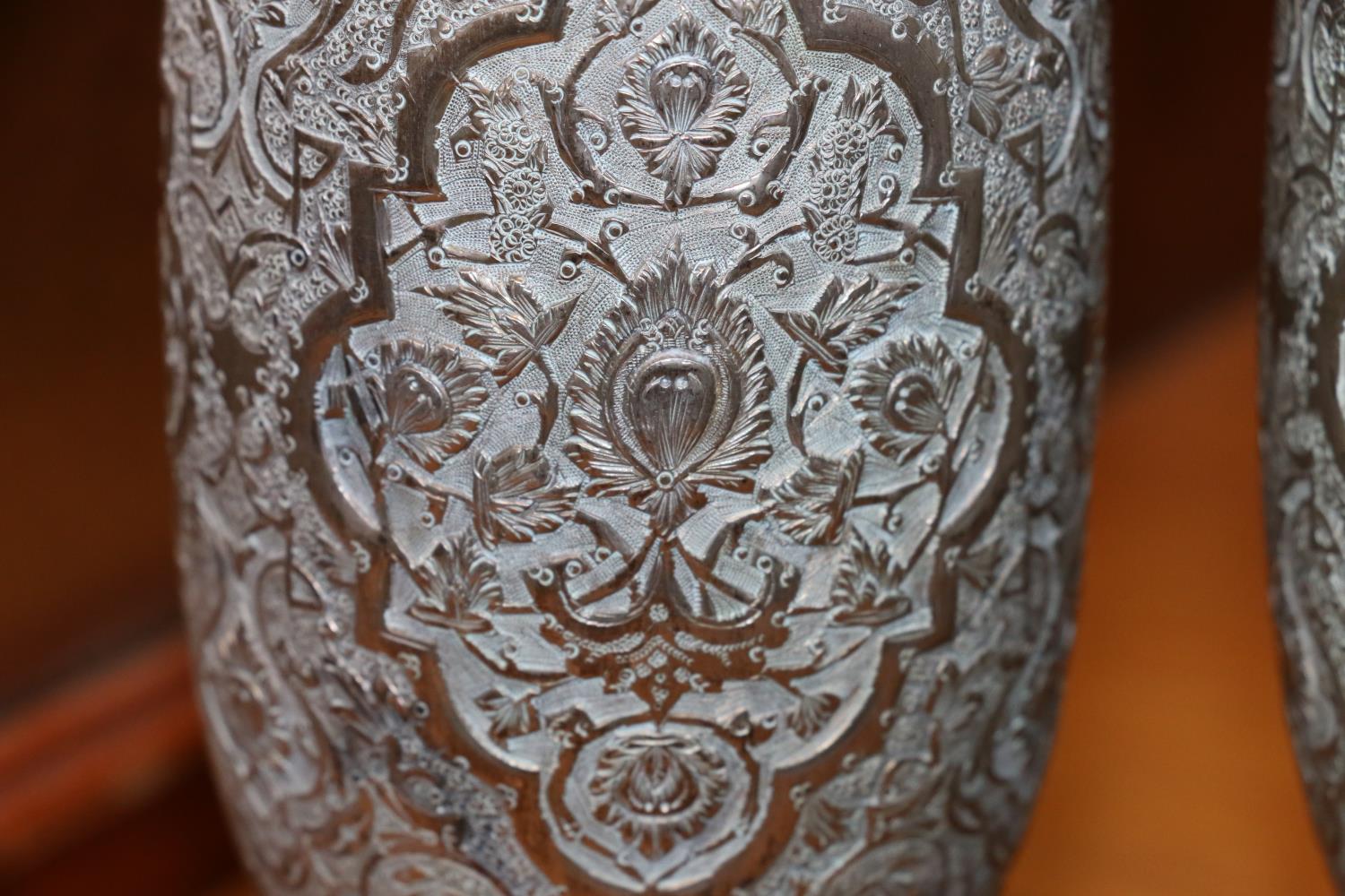 Pair of Indian white metal spill vases decorated with embossed floral designs, Arabic hallmarks, - Image 2 of 4