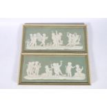 Pair of Wedgwood green jasper ware panels depicting cherubs hunting and cherub musicians, each panel