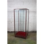 Stained wood display case, the detachable four glass case on plinth stand, with shaped feet.