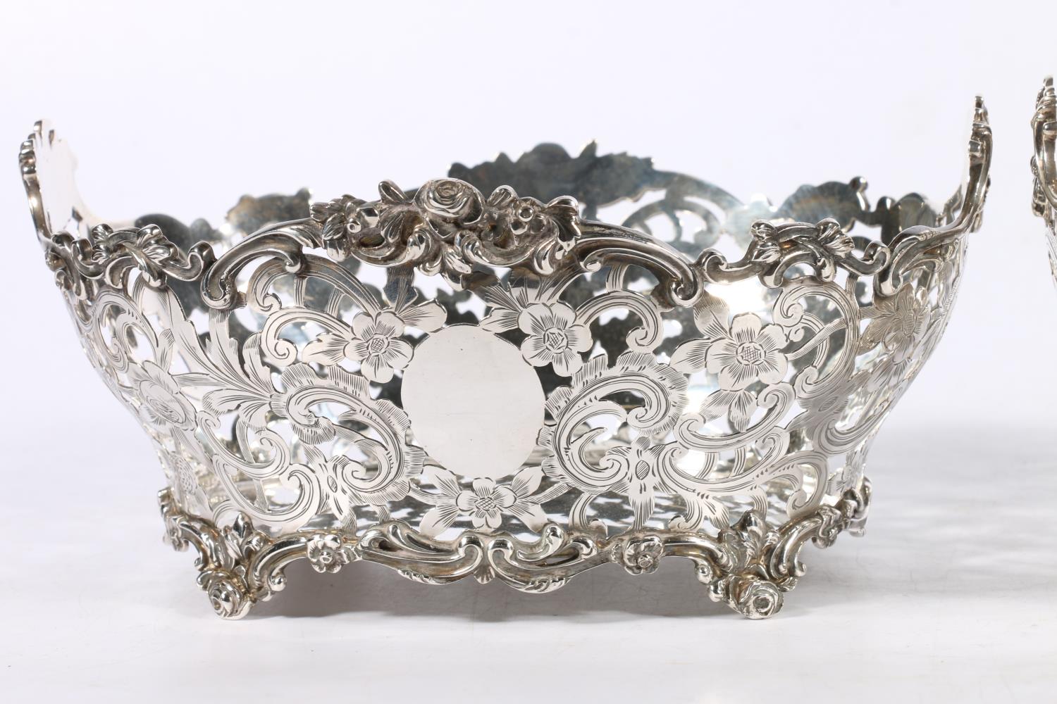 Two Victorian silver baskets with ornate relief and pierced work floral bodies, different makers - Image 3 of 4