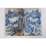Two 19th century oriental blue and white porcelain tiles, decorated as a mirror image of landscape