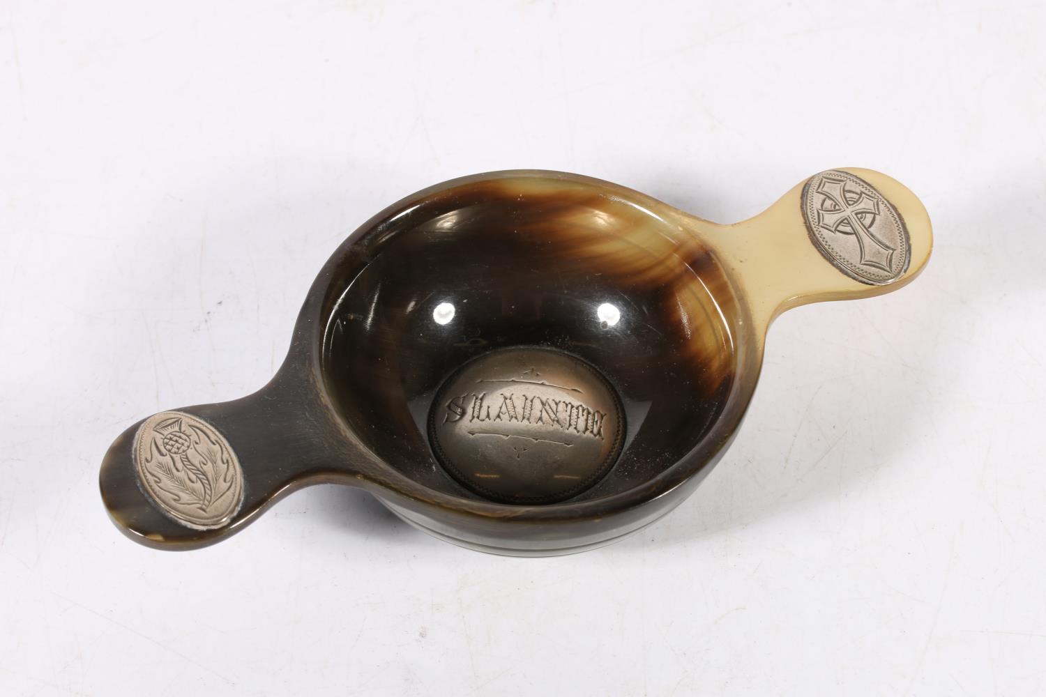 Antique Scottish silver mounted carved horn quaich, the handles inset with navette shaped silver