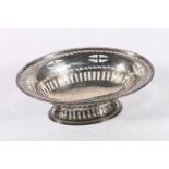 George V silver pedestal bon bon dish of oval shape with pierced bands by Cooper Brothers & Sons