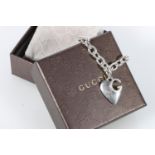 Gucci silver ring link bracelet with 'G' and heart closure, in box with certificate, 36g.