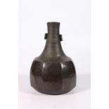 Janet Leach (1918-1997) for St Ives Pottery, a studio pottery cut sided bottle vase, 23cm tall.