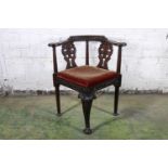 A George III laburnum Scottish corner chair with shell and acanthus leaf carved top rail with carved