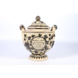 A 19th century German stoneware rumtopf, or lidded wine bowl / tureen, with two handles to sides