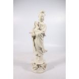 Chinese blanc-de-chine figure of Guanyin, lozenge mark to base, 36cm tall.