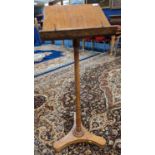 19th century mahogany music stand, with tilt-top, raised on turned support and tripod base, 120cm