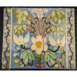 Large Italian relief pottery tile decorated with flowers, 45cmx 54cm.