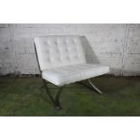 Contemporary model of a Ludwig Mies van der Rohe Barcelona chair with white leather upholstered