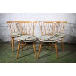 Set of four Ercol blonde tone Shalstone or Candlestick model dining chairs.