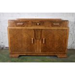 Art Deco style walnut sideboard, the rectangular top with moulded edge above three frieze drawers