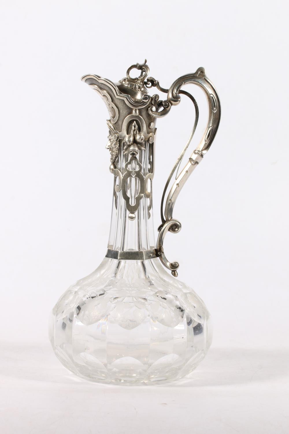 Victorian silver mounted cut and etched glass claret jug, the silver mounts modelled with fruits and