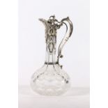 Victorian silver mounted cut and etched glass claret jug, the silver mounts modelled with fruits and