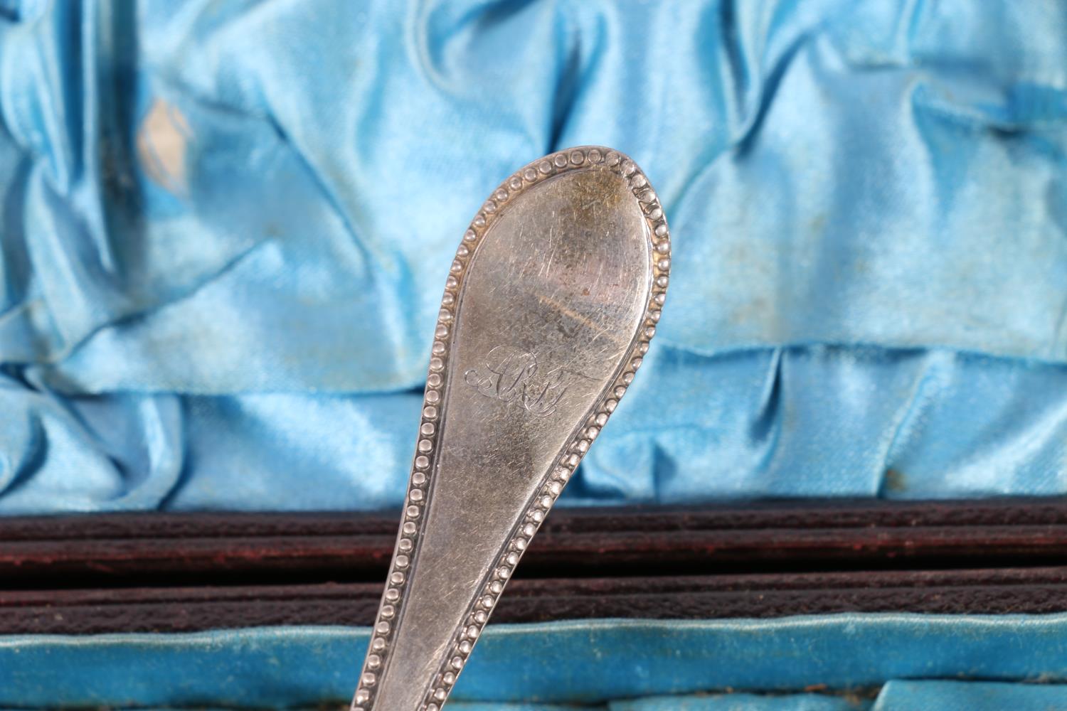 Set of twelve Victorian silver teaspoons with beaded edge and a matching set of sugar tongs, - Image 2 of 3