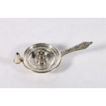 Victorian silver chamber stick with ornate relief decoration by Goldsmiths & Silversmiths Co (