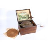 Victorian mahogany cased Symphonion disc music box with four discs, paper label to the inside of the