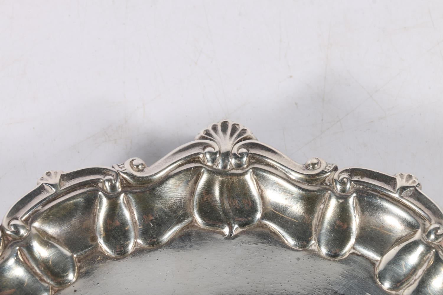 Edwardian silver salver with scallop and scroll border raised on three ball and claw supports by - Image 2 of 3