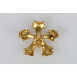 Setsco Pte Ltd of Singapore, a gilt metal brooch in the form of Vanda Merrillii Risis orchid, 11.