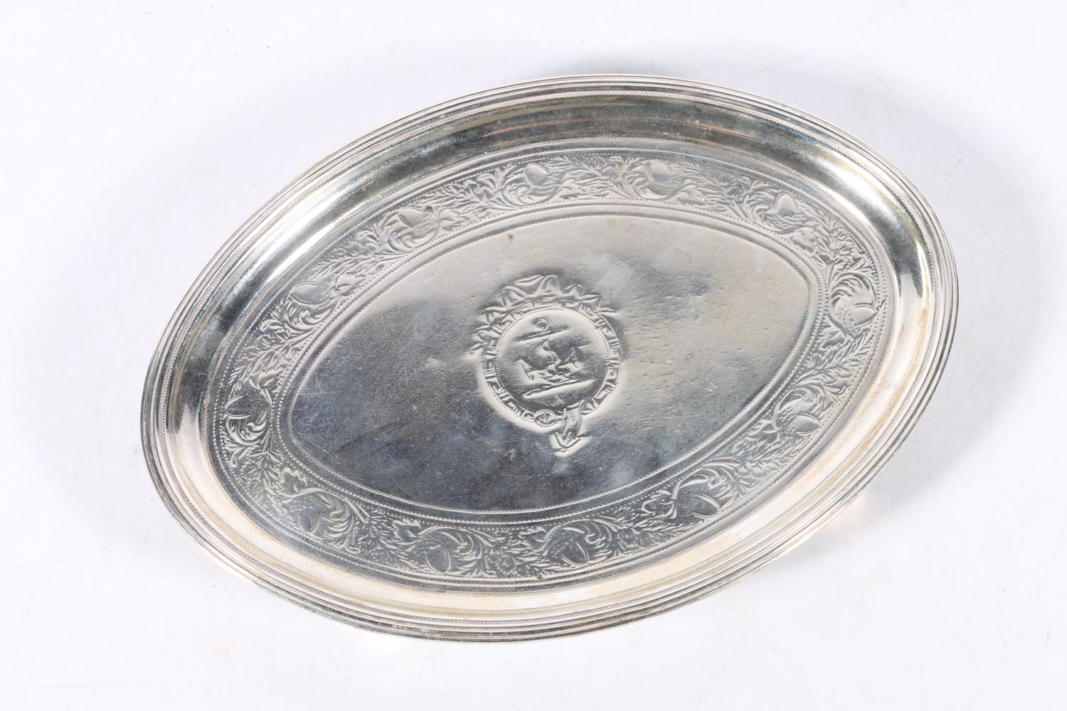 Georgian silver card tray of navette shape with engraved band of fruiting vines by Henry Chawner,