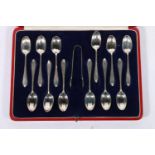 Set of twelve silver teaspoons and sugar tongs by Josiah Williams & Co (David Landsborough