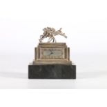 Art Deco silver plated clock, the finial in the form of two gents on horseback playing polo,