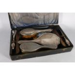 Silver dressing table set comprising hand mirror, hand brush, button hook and shoehorn by J & R