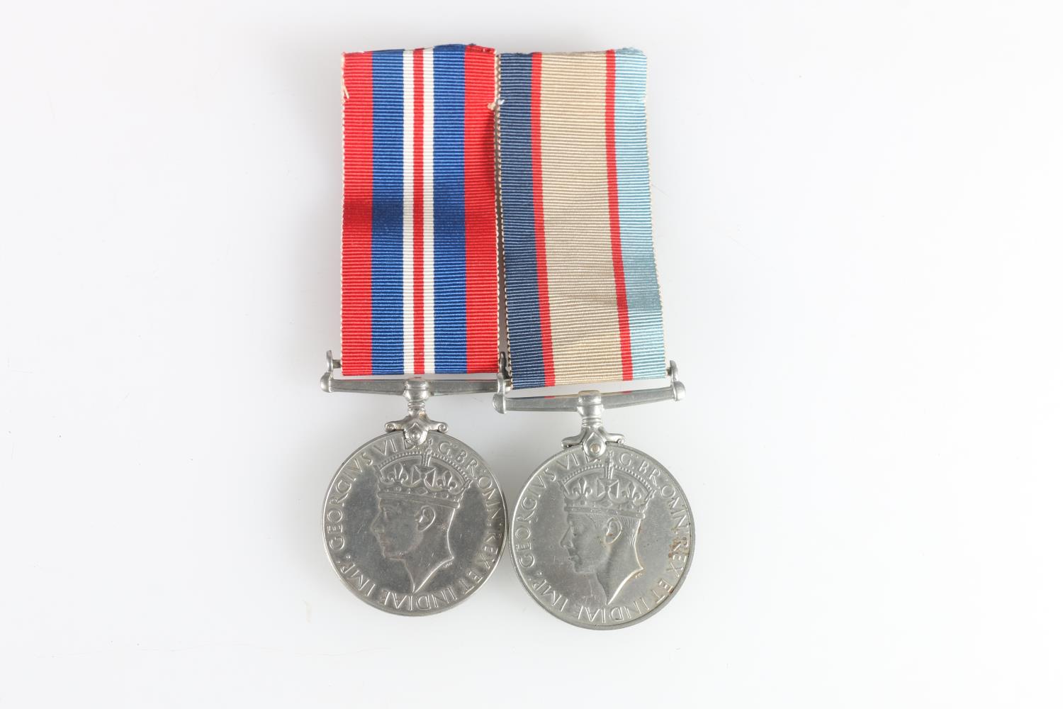 WWII medal pair comprising a George VI Australia Service medal [108899 ANDERSON AM] and British