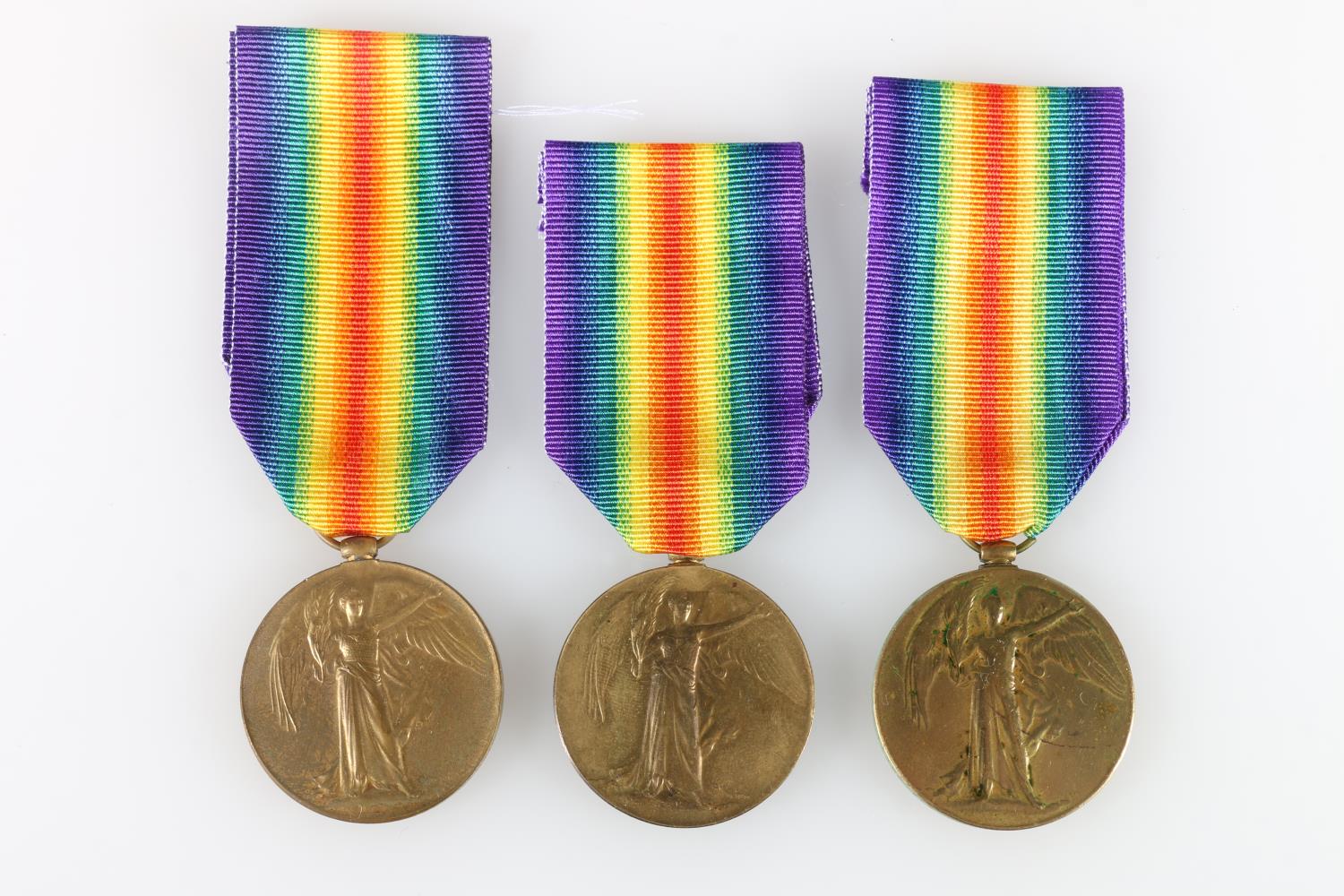 Three WWI Victory medals to include 12410 Lance Corporal Richard M Burns of B Company 2nd