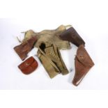Brown leather Walther PPK holster, two other pistol holsters, a British military issue khaki