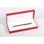 Cartier Must II ball point pen #142190, with guarnentee certificate 'Stylo Bille Must II', boxed.