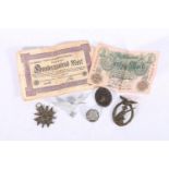 German WWII items including an anti-aircraft Flak badge, a Wound Badge, an aluminium eagle and